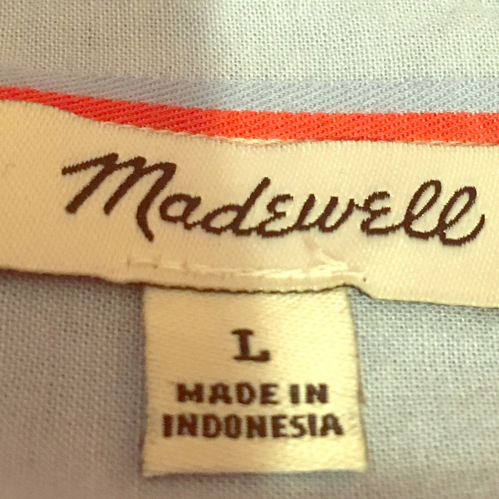 I am selling a mad world shirt size large worn4 tm